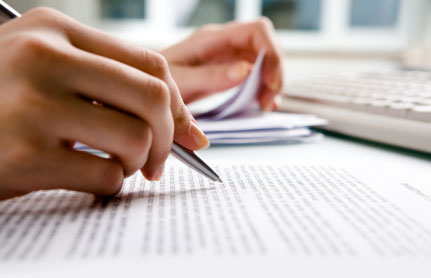 Image of a person writing