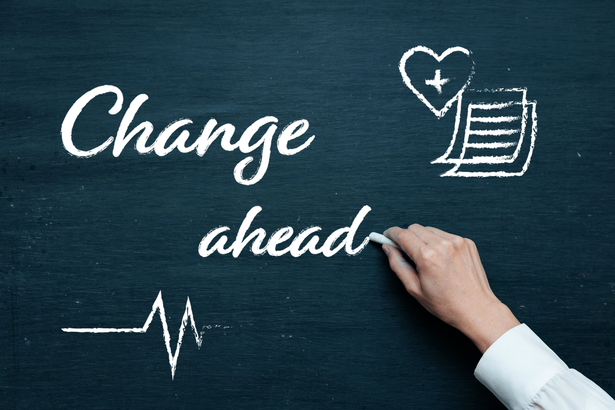 Graphic showing a person's hand writing the phrase Change Ahead on a blackboard.
