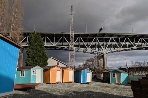 A photograph of a row of tiny houses.