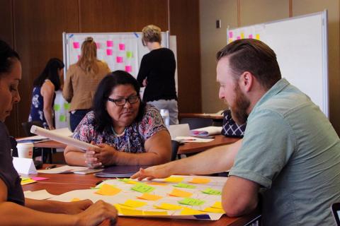 Scholars in discussion at the Public Health Management Certificate Onsite
