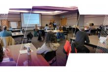 Photo showing Leadership Institute scholars viewing a presentation
