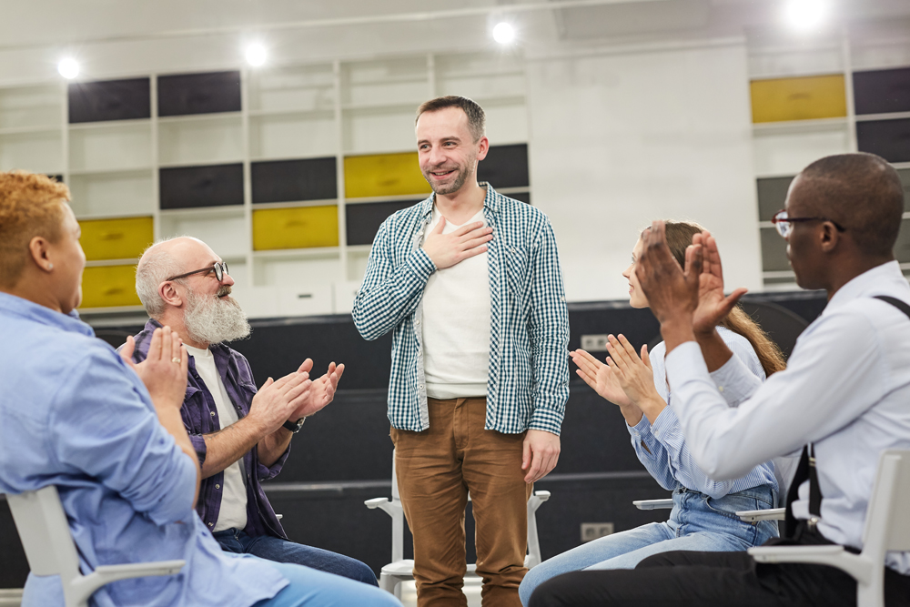 Man participating in a group therapy session
